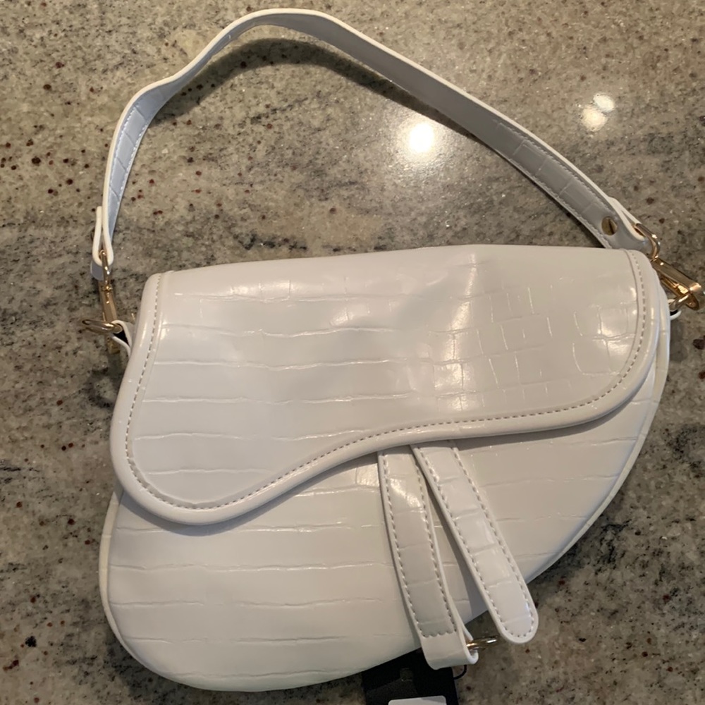 New, never worn white saddle bag